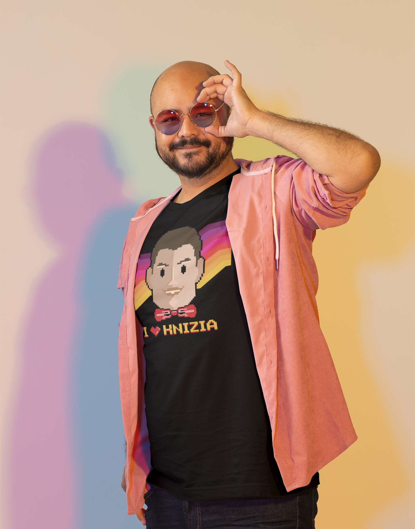 bella-canvas-t-shirt-mockup-featuring-a-happy-bearded-man-with-round-sunglasses-at-a-studio-m24043